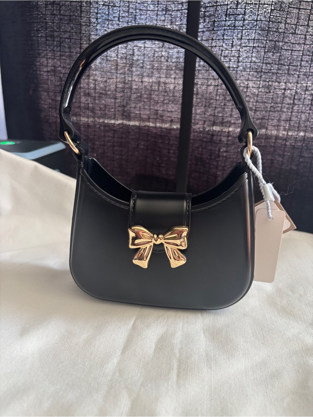 Black Mini Shoulder Bag with Gold Bow Accent